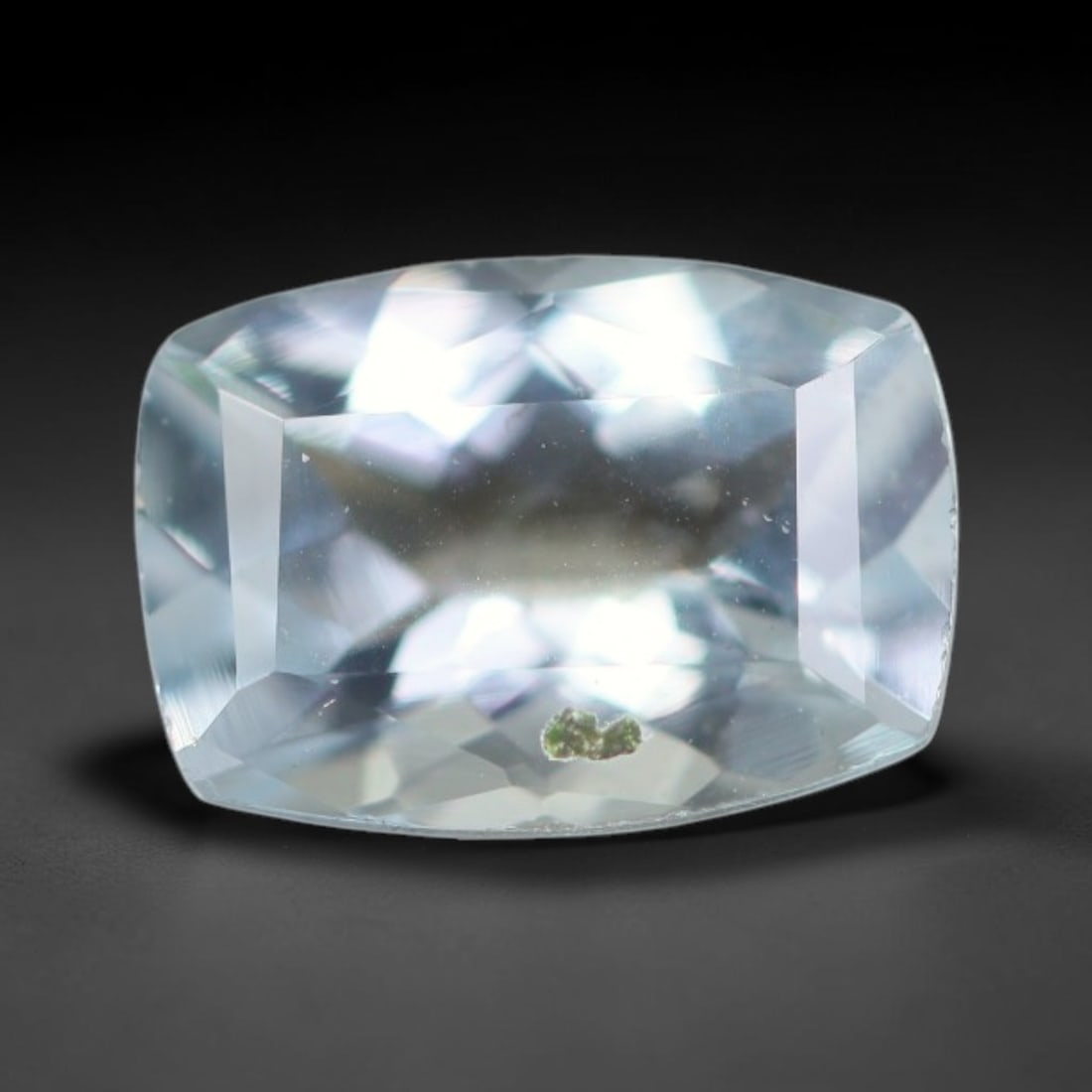 1.26ct Natural Brazilian Sky Blue Faceted Aquamarine Loose Gemstone, 13BC: This precisely faceted aquamarine boasts clear translucent pale sky blue body tone with subtle thin mineral needle and tiny scattered crystalline specks visible within its polished reflective planes i