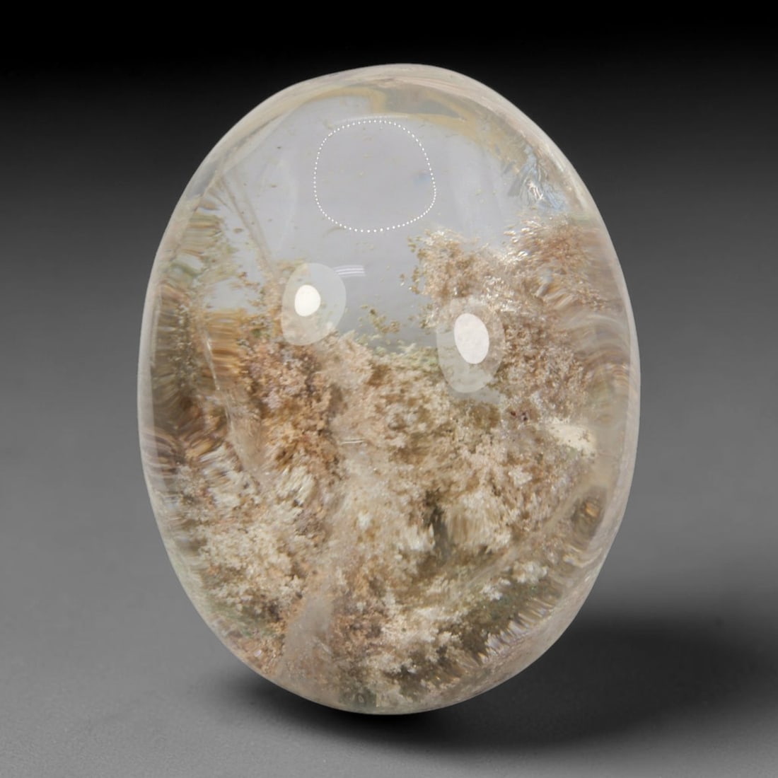 34ct Natural Brazilian Phantom Quartz Oval Cabochon Loose Gemstone, 10BM: This smoothly polished cabochon of natural phantom quartz preserves delicate layered phantom crystal formations enclosed inside transparent quartz host. The domed polished surface offers unobstructed 