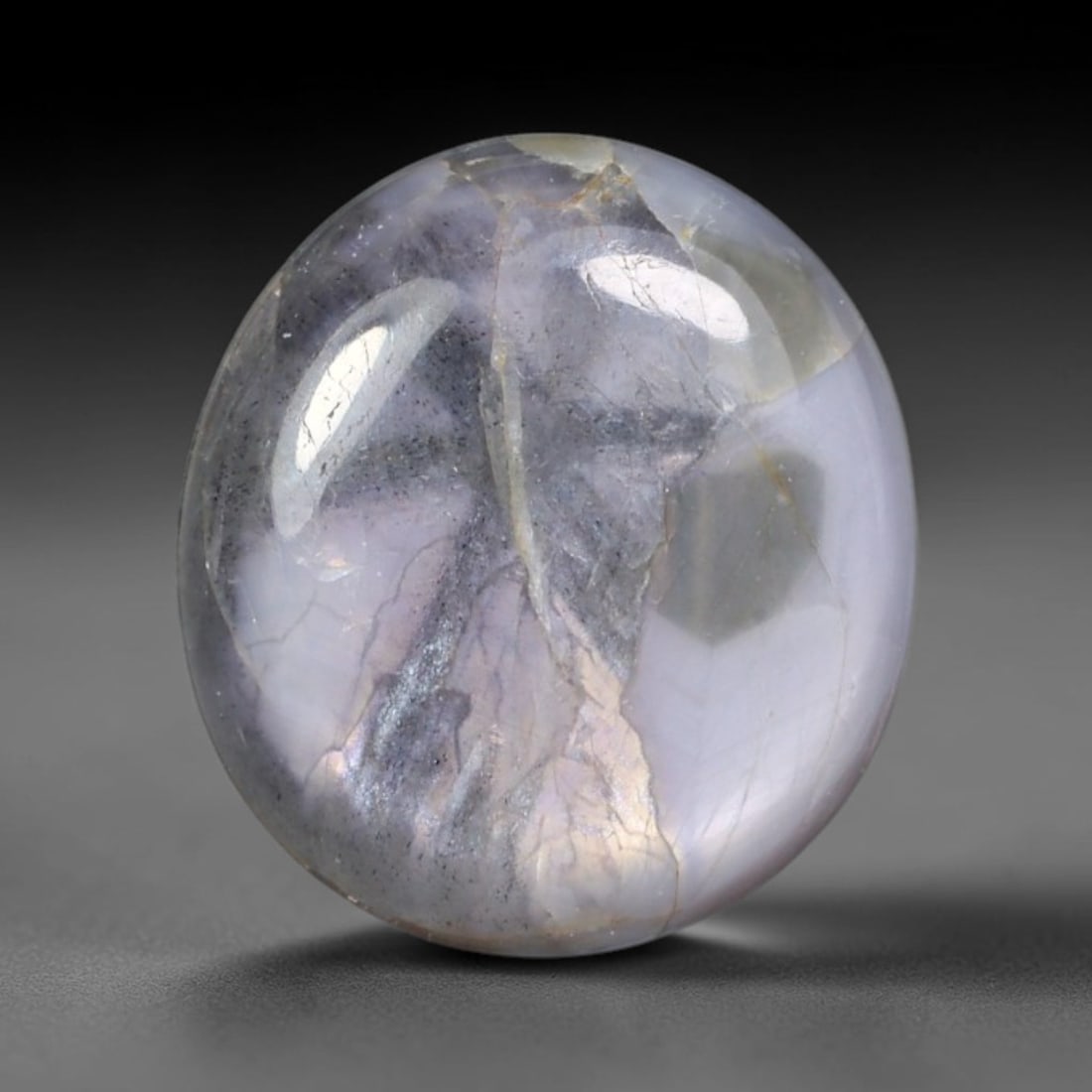 3.69ct Natural Untreated Burmese Trapiche Sapphire Loose Gemstone, 64BE: This polished Burmese trapiche sapphire features soft milky pale base tone with distinct natural mineral growth formations within its crystalline structure, measured at calibrated dimensions of 8.8x8.