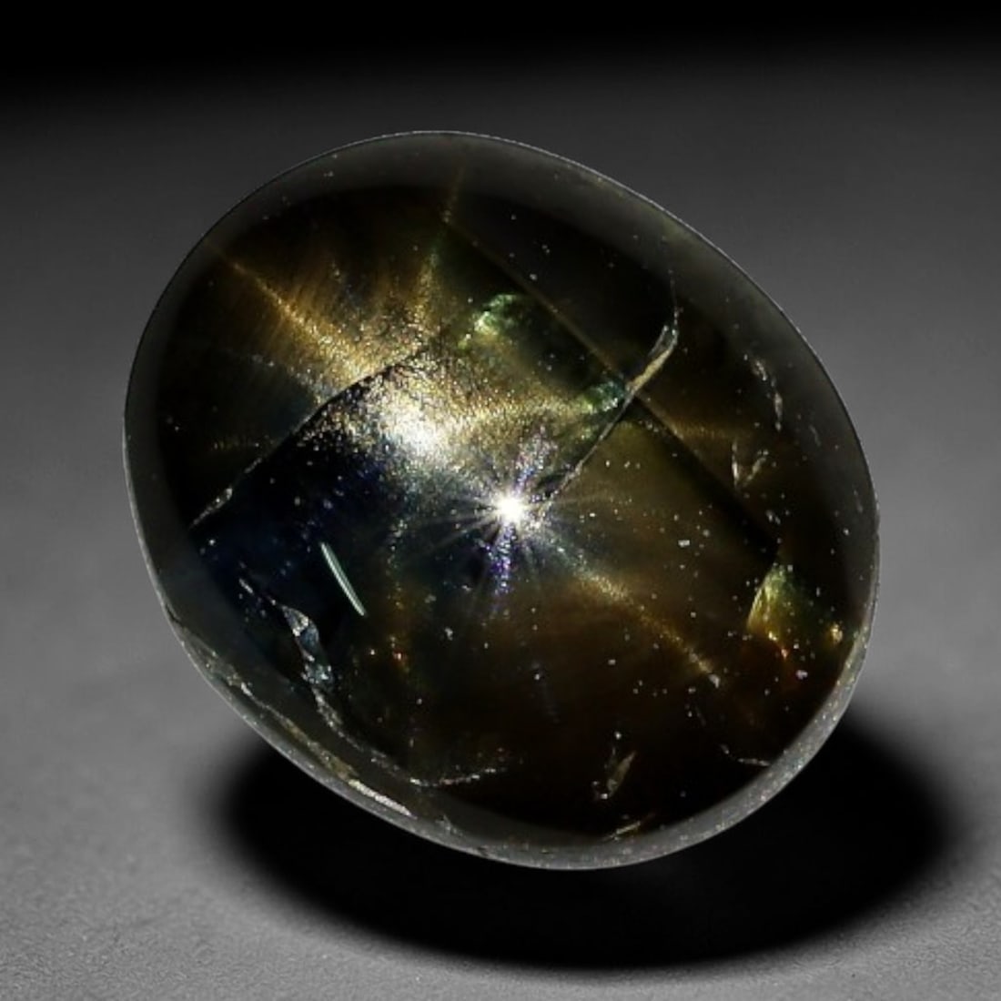 2.10ct Natural Siamese 6-Ray Black Star Sapphire Loose Gemstone, 56BX: This polished star sapphire originates from classic Siamese mining deposits, featuring a deep dark crystalline base with fine native mineral traces trapped within its structure, sized at calibrated 8x