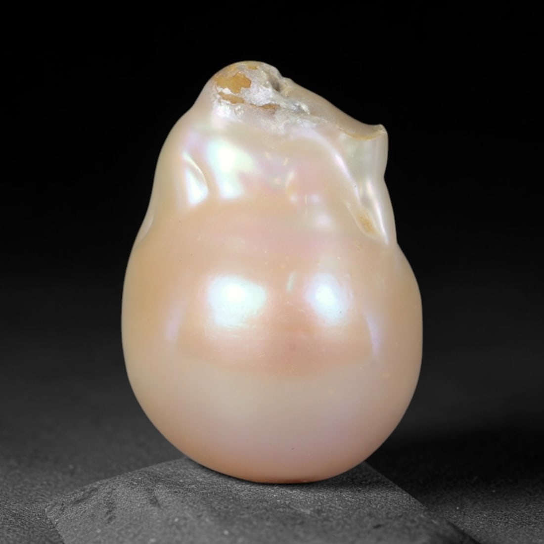 Natural Freshwater Keshi Pearl - Iridescent Baroque Pearl Ornament, 65AE: A natural freshwater keshi pearl with organic asymmetrical baroque shaping, exhibiting soft creamy blush base tones with shifting pastel pink, lavender and pale gold iridescent luster across its smoot