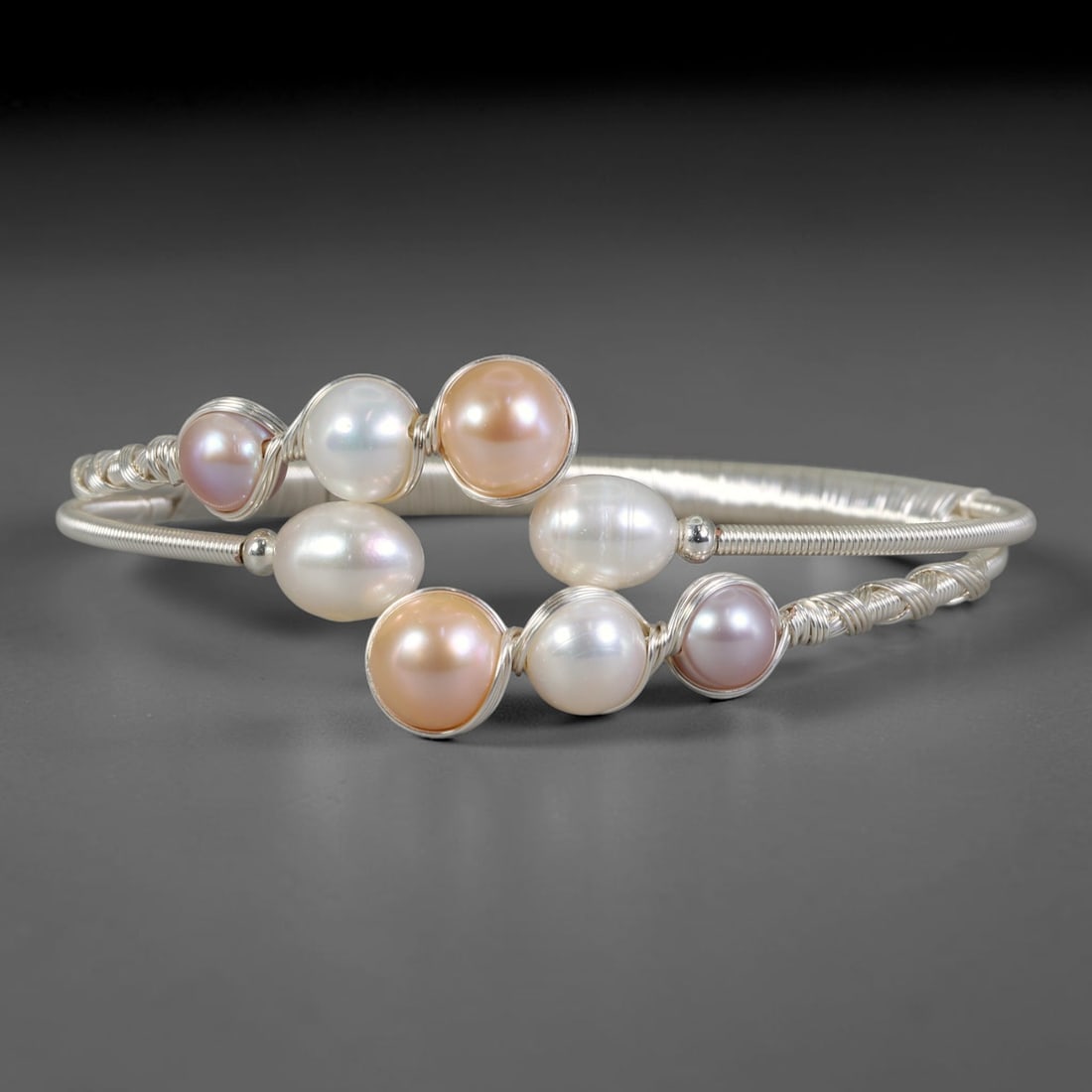 Natural Cultured Freshwater Pearl White Gold Plated Wire Wrap Open Cuff Bracelet, 90AC: Artisan handcrafted adjustable open cuff bracelet fashioned from smooth white gold plated metal wire, set with genuine natural cultured freshwater pearls held by elaborate hand-woven wirework detailin