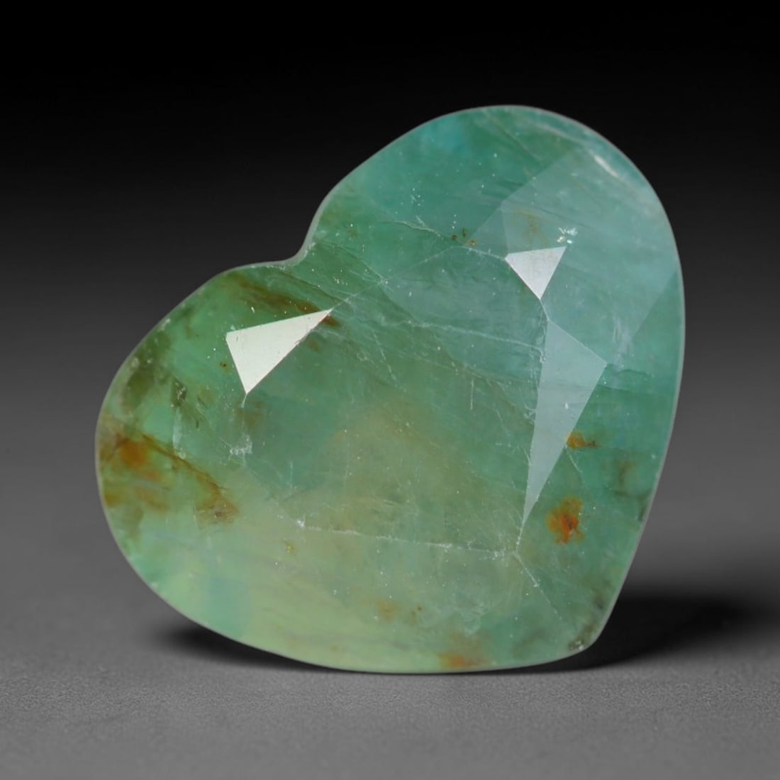 4.06ct Natural Madagascan Faceted Grandidierite Rare Loose Gemstone, 24AS: This expertly faceted finished grandidierite holds soft translucent body tone with fine faint natural internal veining visible beneath precisely cut reflective facets within its 12.3x10.1x5.3mm calibr