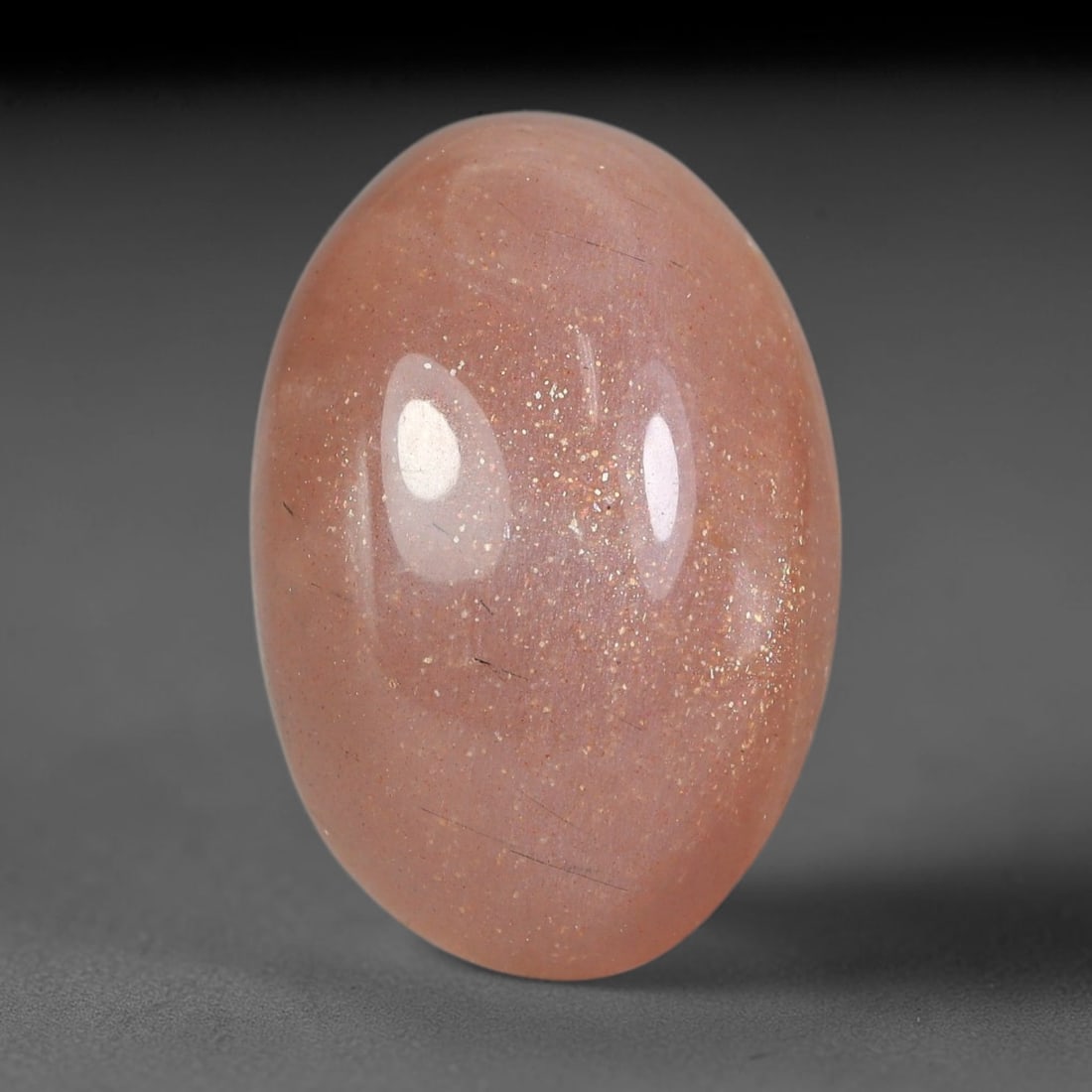 20 Carats Natural Ceylon Warm Peach Moonstone Loose Gemstone, 87FE: This natural Ceylon moonstone has dimension measurements of 22x15x9mm, showcasing a smooth warm peach base tone paired with subtle soft adularescent sheen that glides gently across the polished surfac