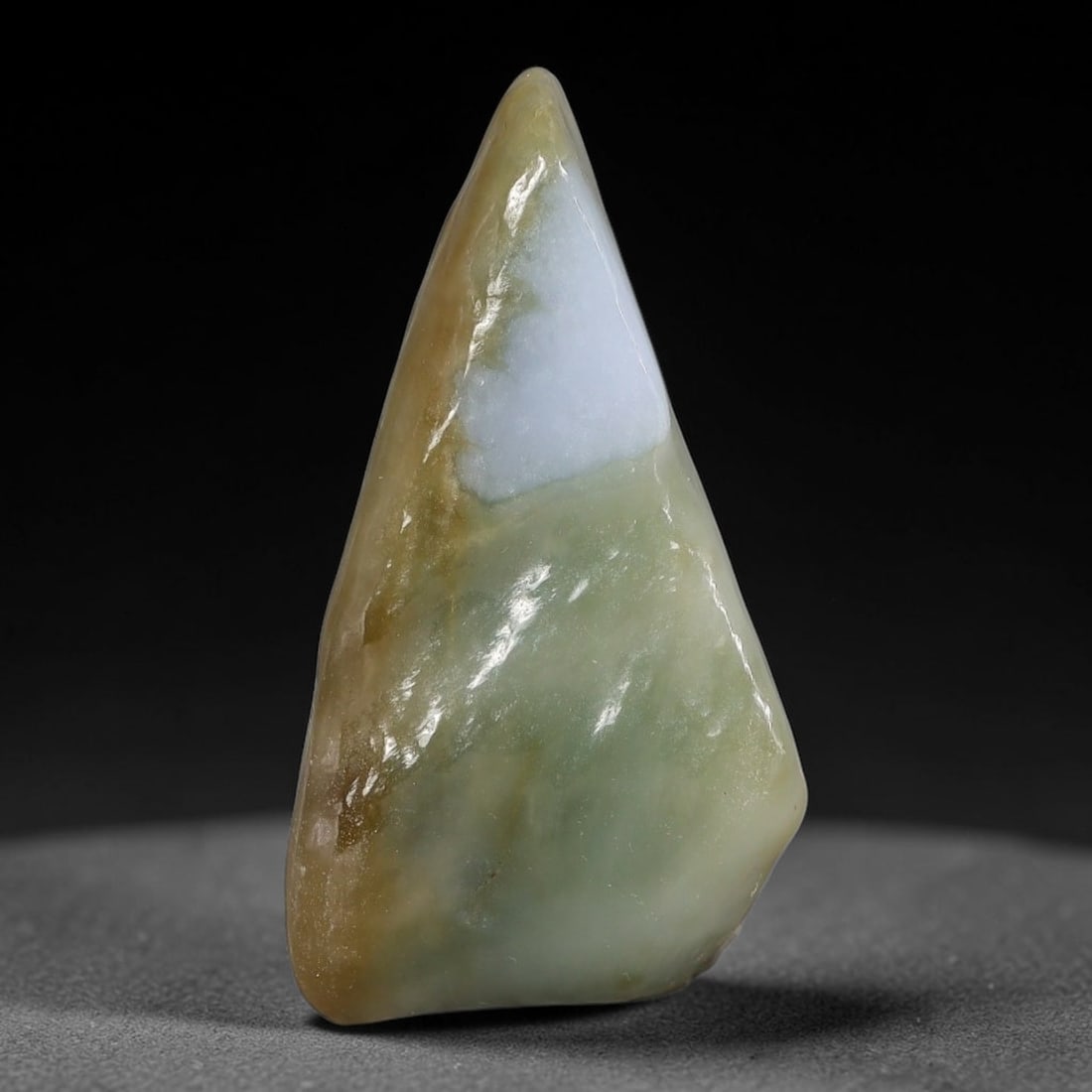 98ct Natural Type A Burmese Jadeite Jade Polished Sliced Rough, 84AZ: This specimen is a sliced rough block of natural Type A Burmese jadeite jade. The interior displays natural colour zoning with visible mineral veining and crystalline patterns typical of unprocessed j