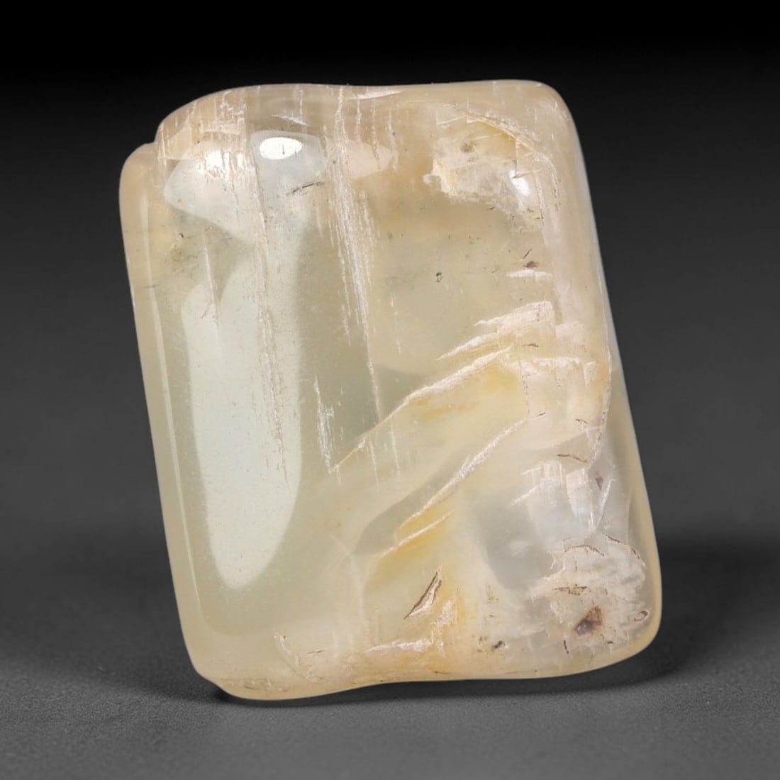 54ct Natural Ceylon Pale Cream White Moonstone Rough, 69AH: This smooth weathered moonstone rough carries soft pale cream white translucency with subtle internal silvery adularescent shimmer locked within its naturally tumbled surface, fine faint mineral veini