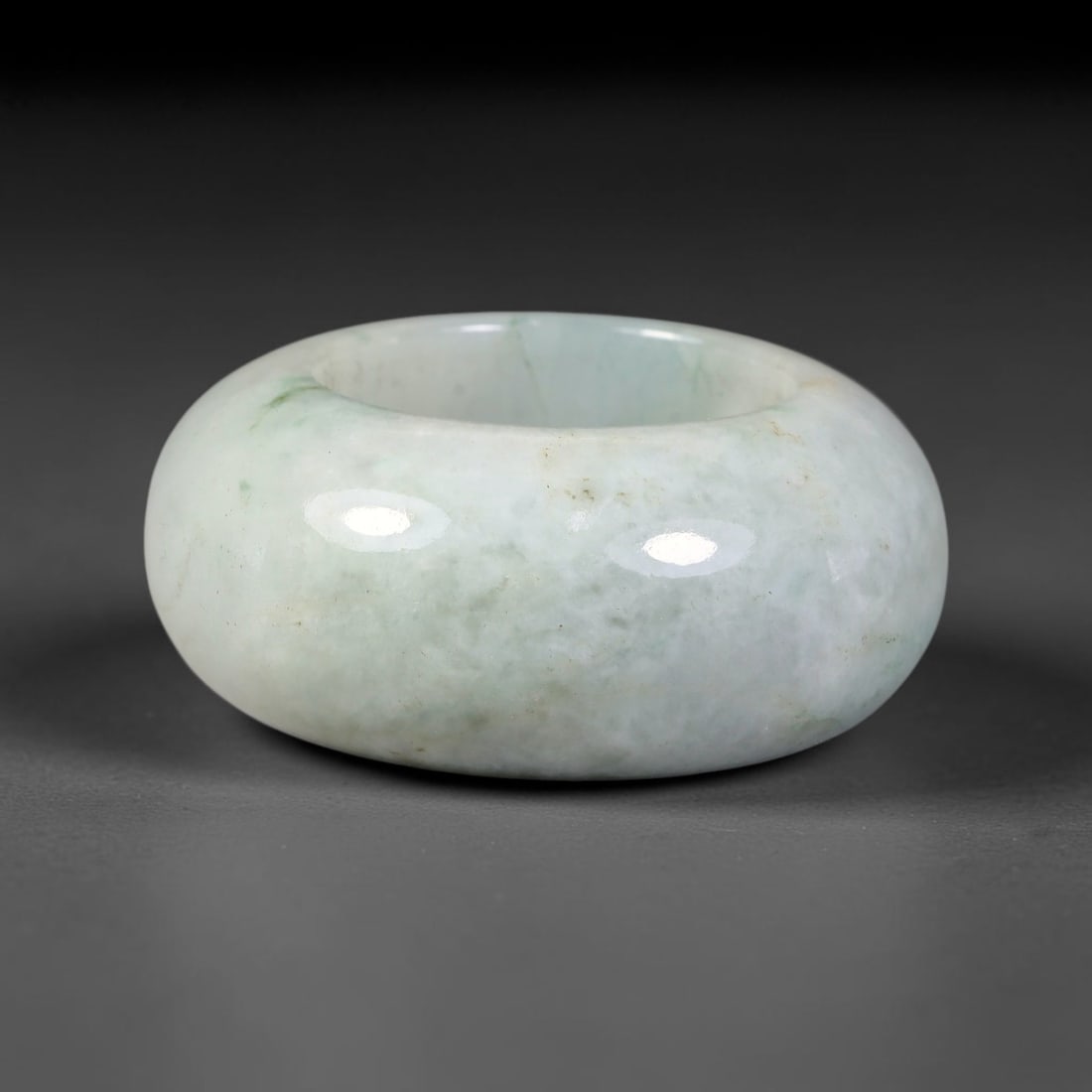 Natural Burmese Type A Jadeite Jade Wide Band Ring, 28BK: Polished untreated Burmese Type A jadeite jade wide band ring, US ring size 12.75 with a substantial band width of 16 mm. The jadeite features a soft pale mint green base naturally streaked with flowi