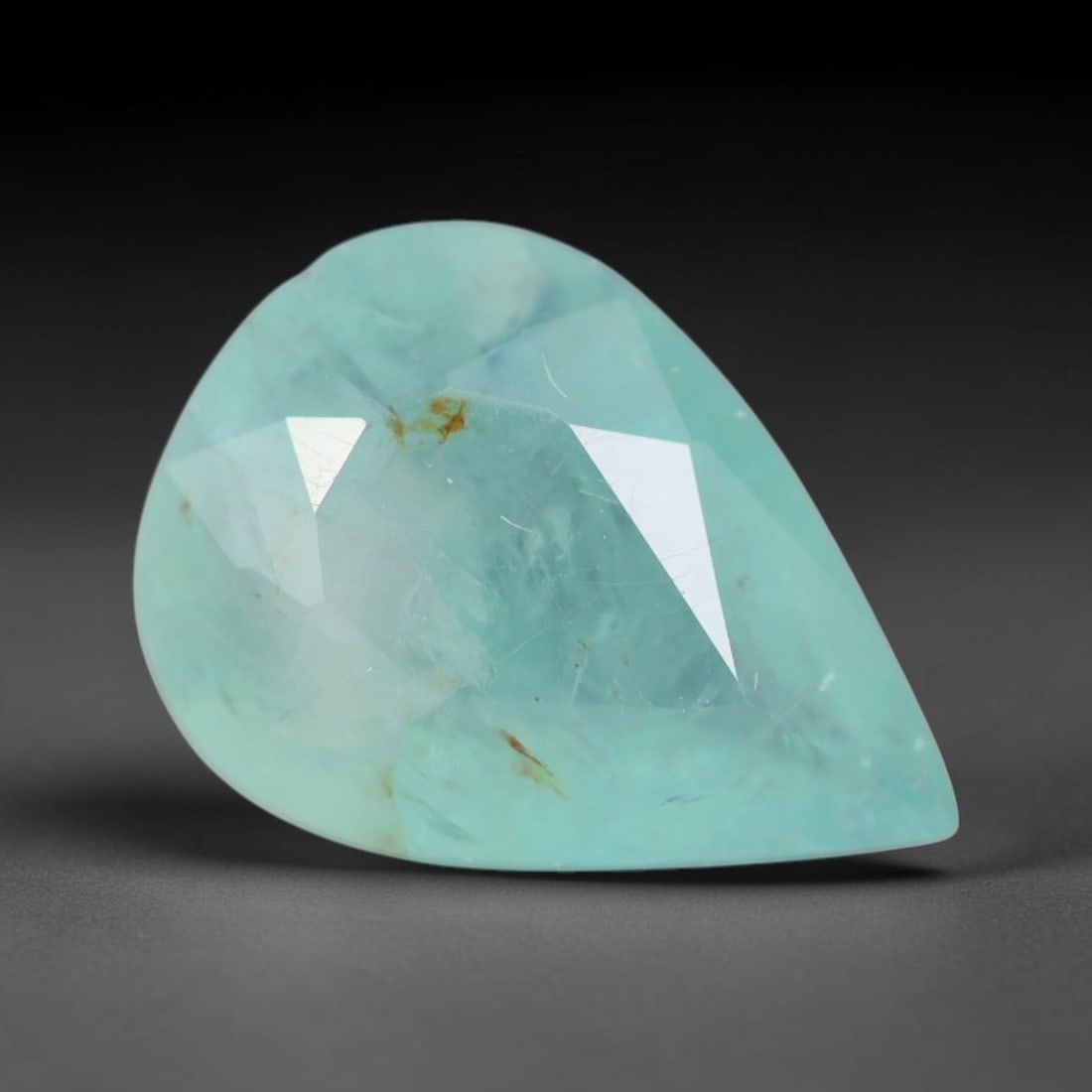 2.21ct Natural Madagascan Faceted Grandidierite Rare Loose Gemstone, 40AS: This expertly faceted finished grandidierite holds soft translucent body tone with fine faint natural internal veining visible beneath precisely cut reflective facets within its 11.3x8.2x4.2mm calibra