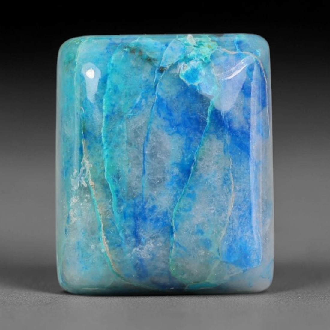 12.46ct Natural Peruvian Chrysocolla Cabochon Loose Gemstone, 99EP: This natural chrysocolla cabochon from Peru displays beautiful blended mineral patterns across its smoothly polished surface. Dimensions measure 15x12x6mm, this wellfinished cabochon works wonderfully