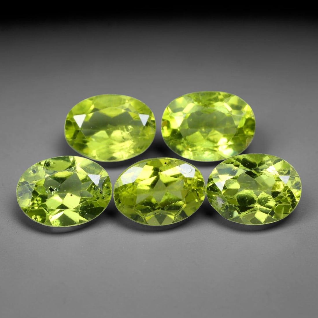 6.75ct Natural Pakistani Himalayan Peridot Parcel Loose Gemstones, 36BE: This matched parcel of polished Himalayan peridot originates from Pakistan's renowned mountain mining regions, showcasing vibrant lime-green body saturation, with fine native mineral inclusions natura