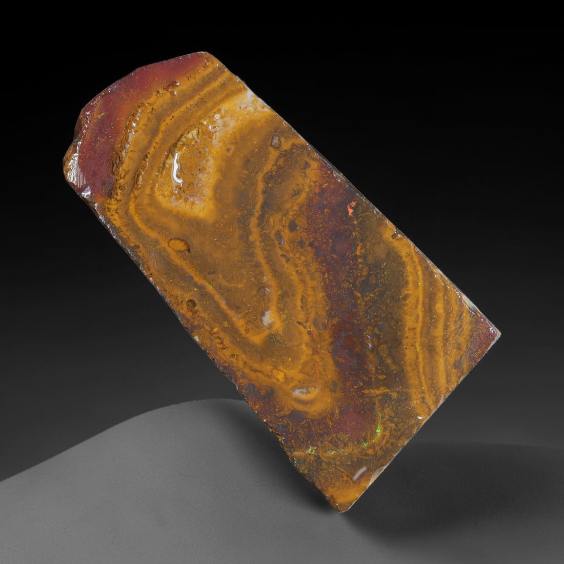 129.83ct Natural Australian Queensland Boulder Opal Sliced Slab Cutting Rough, 39AX: Natural sliced slab rough of Queensland boulder opal cutting grade, featuring rich color ironstone matrix with patterns. The face clearly reveals extensive opal veining and pocket formations running t