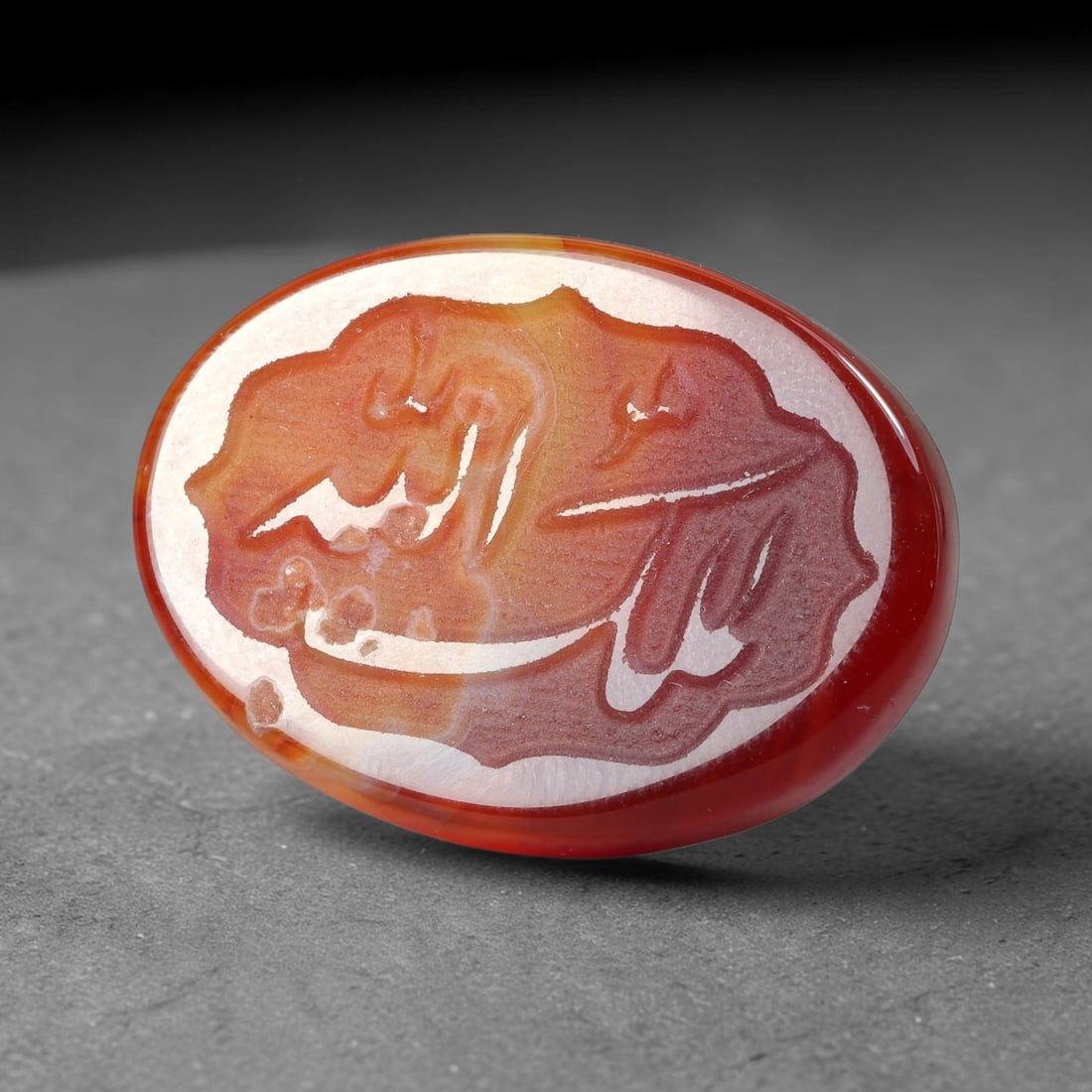 Vintage Carnelian Agate Islamic Calligraphic Script Intaglio Seal Cabochon Talisman, 42EP: This vintage natural carnelian agate intaglio seal cabochon draws inspiration from historic Islamic lapidary traditions, crafted as a wearable talisman and seal blank for jewelry setting. The polished