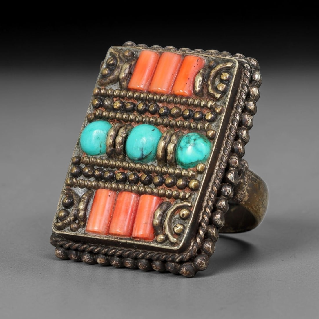 Vintage Tibetan Tribal Silver Plated Gemstone Inlay Ring, US Size 10, 98BY: Vintage Tibetan constructed ring with silver plated metal framework. The face features carefully set natural mineral inlays surrounded by detailed traditional metal ornamentation and textured border d
