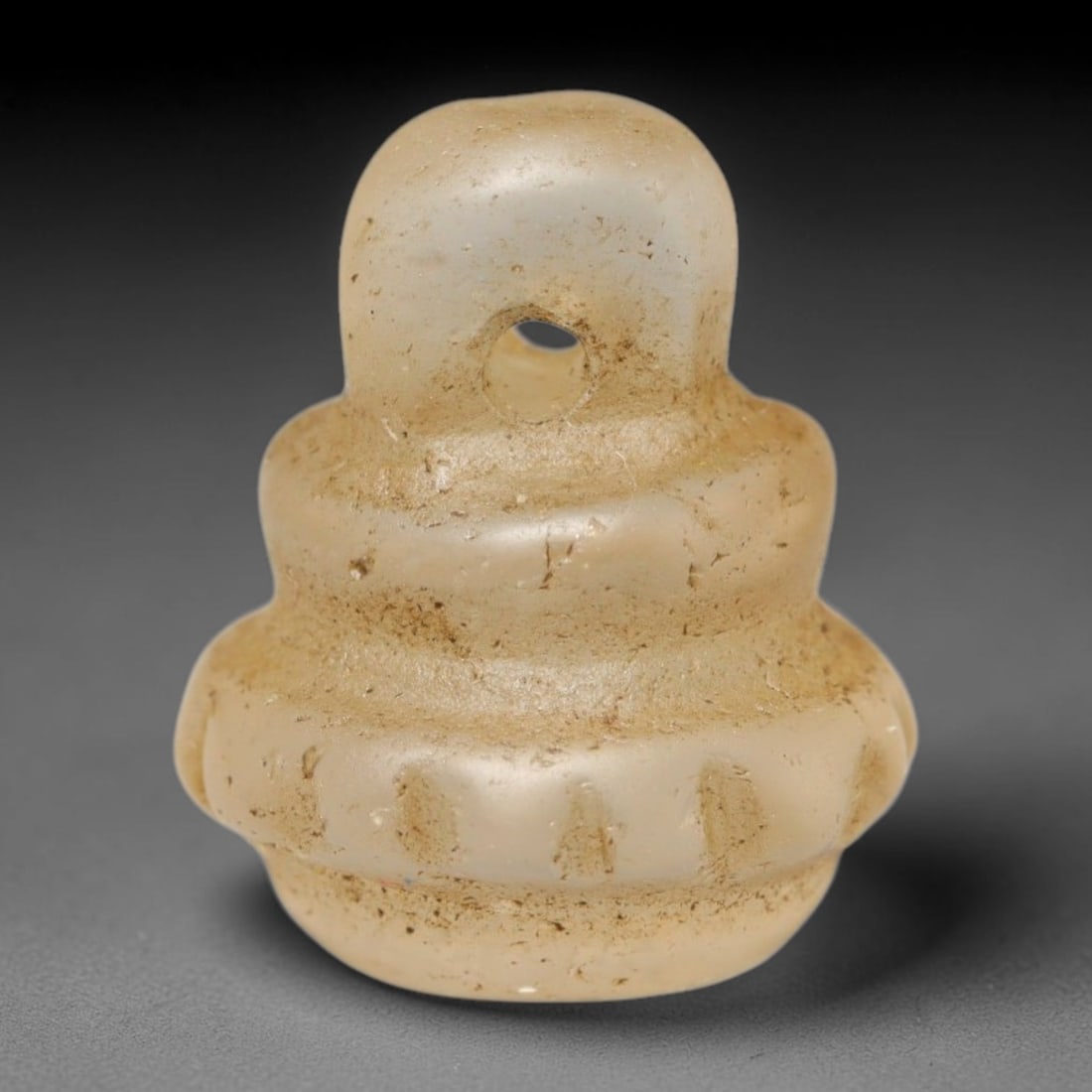 Ancient Medieval Coptic Christian Egyptian Culture Rock Crystal Amulet (300-1000 CE), 17FY: This antique rock crystal amulet originates from Coptic Christian Egyptian Culture, a region with a long-standing tradition of crafting translucent hardstone talismans for devotional and funerary use.