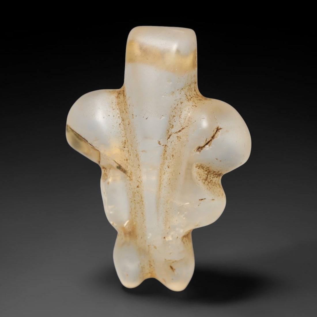 Ancient Medieval Coptic Christian Egyptian Culture Rock Crystal Amulet (300-1000 CE), 20FY: This antique rock crystal amulet originates from Coptic Christian Egyptian Culture, a region with a long-standing tradition of crafting translucent hardstone talismans for devotional and funerary use.