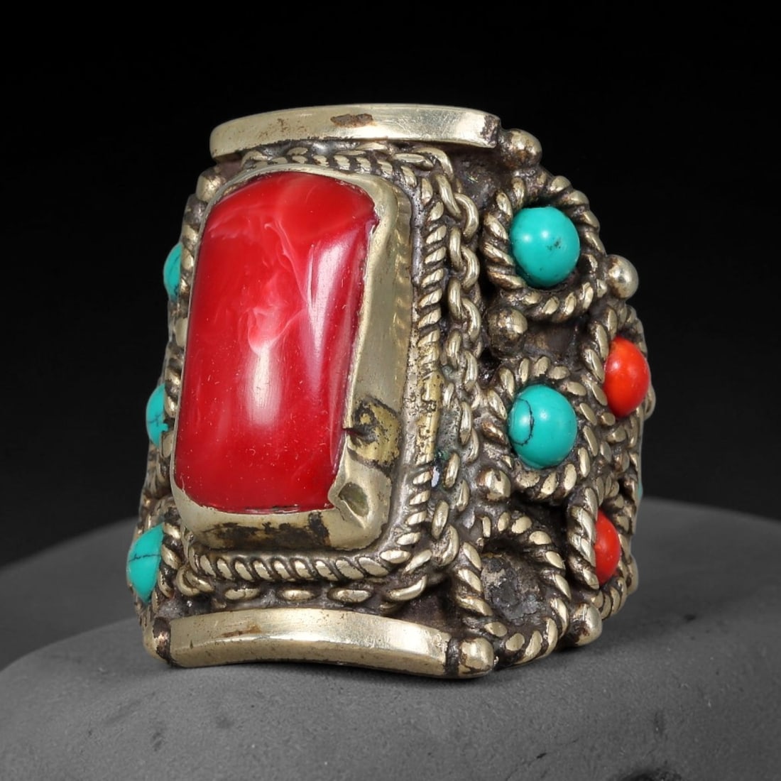 Vintage Tibetan Tribal Silver Plated Gemstone Inlay Ring, US Size 10.5, 84BY: Vintage Tibetan constructed ring with silver plated metal framework. The face features carefully set natural mineral inlays surrounded by detailed traditional metal ornamentation and textured border d