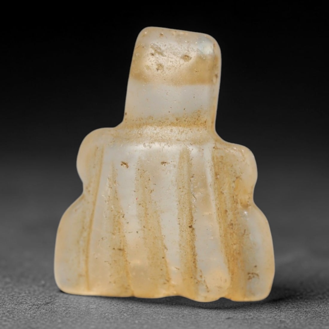 Ancient Medieval Coptic Christian Egyptian Culture Rock Crystal Amulet (300-1000 CE), 85FY: This antique rock crystal amulet originates from Coptic Christian Egyptian Culture, a region with a long-standing tradition of crafting translucent hardstone talismans for devotional and funerary use.