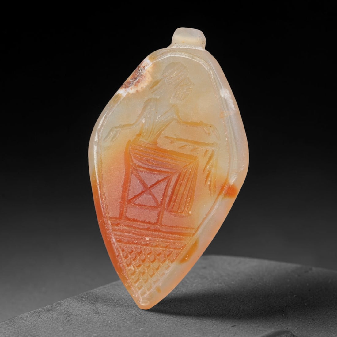 Vintage Natural Carnelian Agate Revival Indo-Persian Glyptic Figural Talisman Amulet Plaque, 44FK: This vintage talisman pendant plaque is skillfully carved from natural banded carnelian agate, crafted in a style referencing ancient Indo-Persian glyptic art traditions. The face bears detailed relie