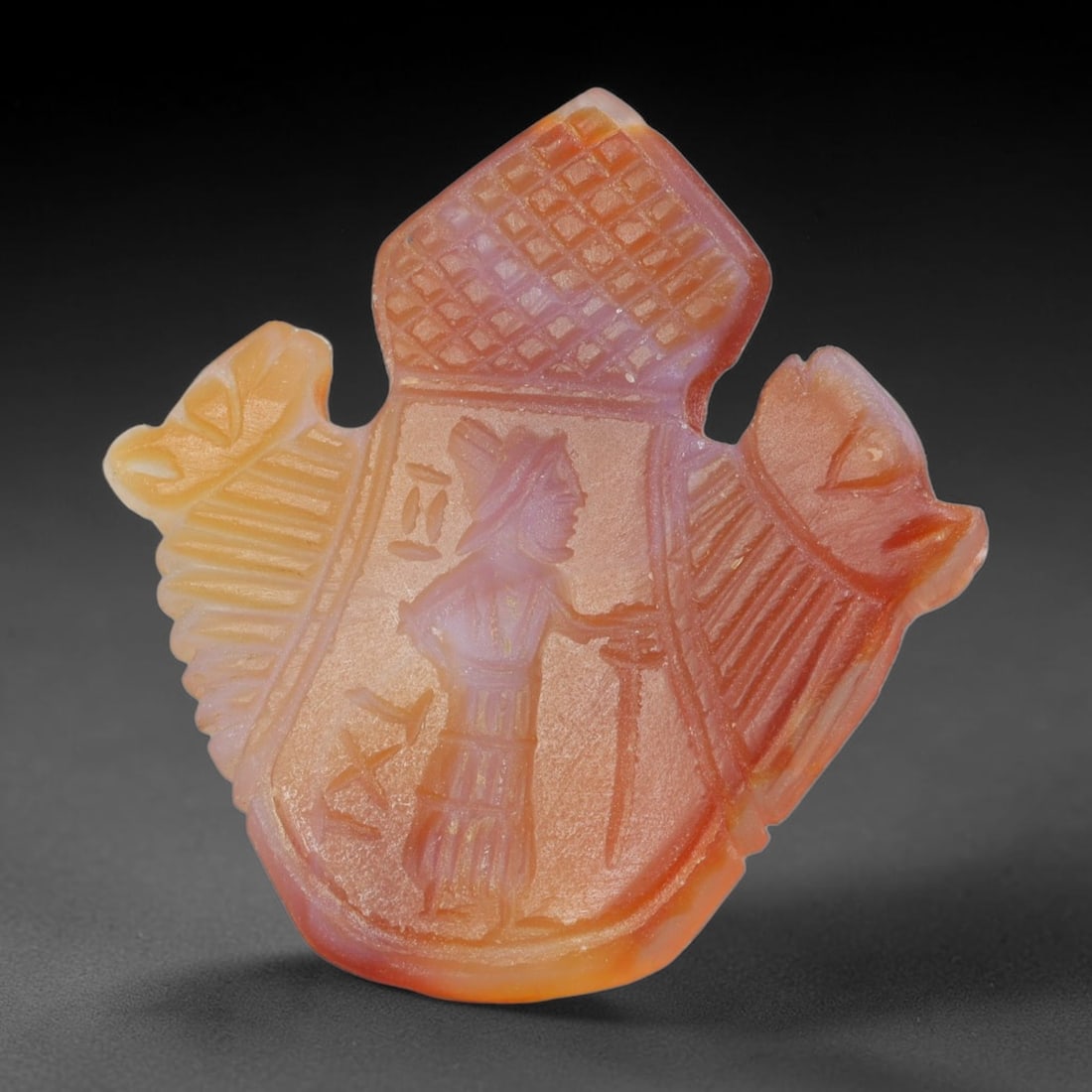 Vintage Natural Carnelian Agate Revival Indo-Persian Glyptic Figural Talisman Amulet Plaque, 17FK: This vintage talisman pendant plaque is skillfully carved from natural banded carnelian agate, crafted in a style referencing ancient Indo-Persian glyptic art traditions. The face bears detailed relie