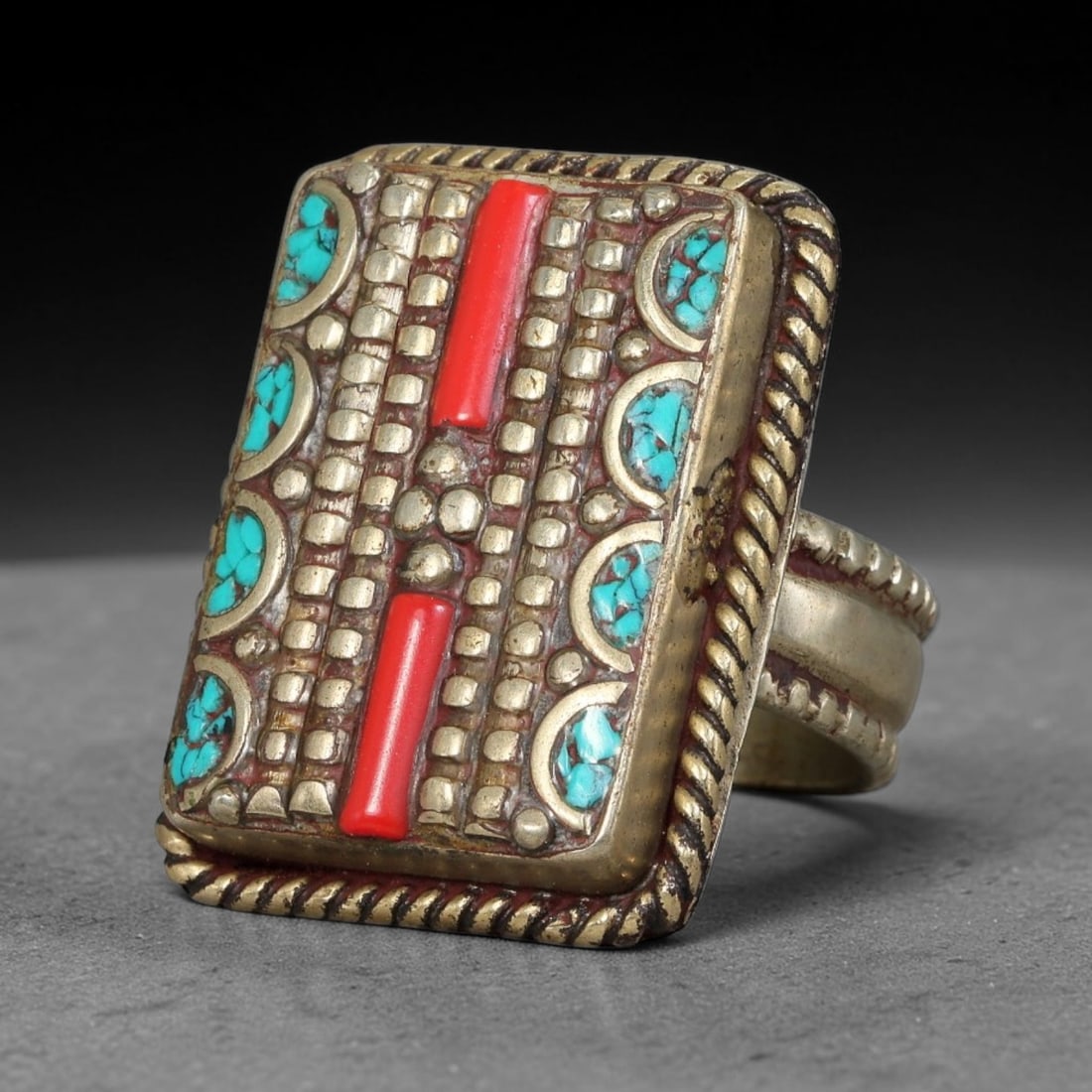 Vintage Tibetan Tribal Silver Plated Gemstone Inlay Ring, US Size 8, 80BY: Vintage Tibetan constructed ring with silver plated metal framework. The face features carefully set natural mineral inlays surrounded by detailed traditional metal ornamentation and textured border d