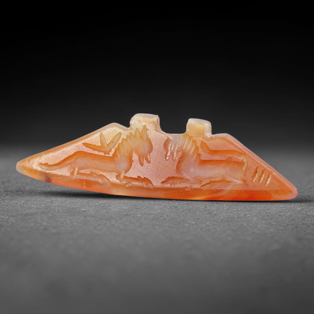 Vintage Natural Carnelian Agate Revival Indo-Persian Glyptic Figural Talisman Amulet Plaque, 37FL: This vintage talisman pendant plaque is skillfully carved from natural banded carnelian agate, crafted in a style referencing ancient Indo-Persian glyptic art traditions. The face bears detailed relie