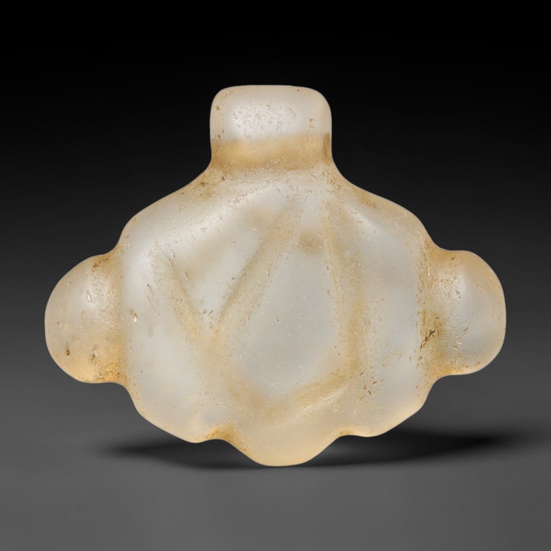 Ancient Medieval Coptic Christian Egyptian Culture Rock Crystal Amulet (300-1000 CE), 21FY: This antique rock crystal amulet originates from Coptic Christian Egyptian Culture, a region with a long-standing tradition of crafting translucent hardstone talismans for devotional and funerary use.