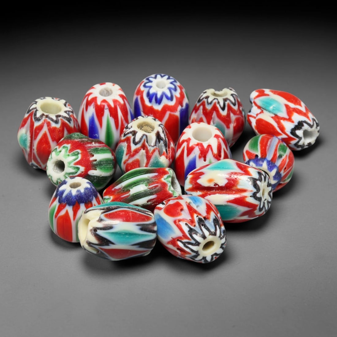 Vintage Chevron Glass Trade Bead Parcel Lot, 15EG: Vintage chevron glass bead collection, well-preserved with characteristic aged glass surface texture. Largest bead measures 14x11mm, suitable for jewellery assembly, collection and antique bead tradin