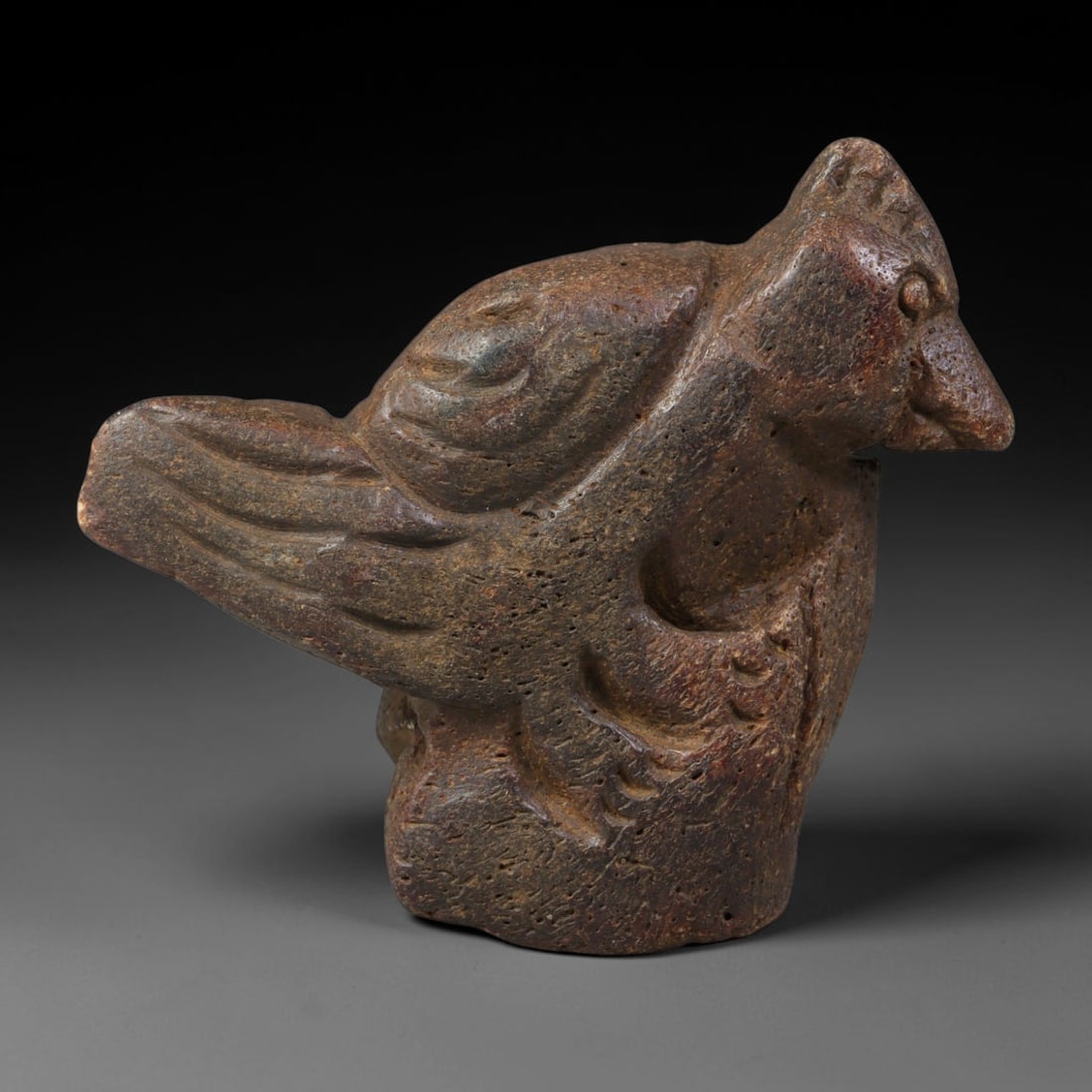 Ancient Medieval Near Eastern Tribal Hand Carved Fossil Bone Effigy Amulet, 42AC: Mid-sized antique wearable sacred effigy meticulously carved from natural fossil bone material, originating from Medieval Near Eastern tribal folk craft traditions. Fossil bone was a meaningful organi