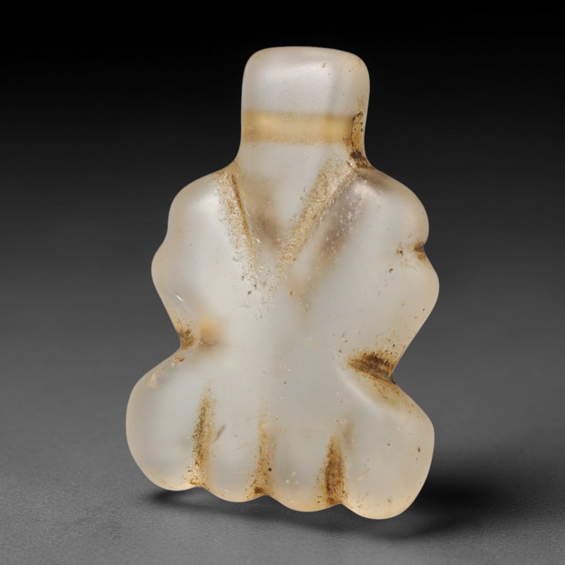 Ancient Medieval Coptic Christian Egyptian Culture Rock Crystal Amulet (300-1000 CE), 3FV: This antique rock crystal amulet originates from Coptic Christian Egyptian Culture, a region with a long-standing tradition of crafting translucent hardstone talismans for devotional and funerary use.