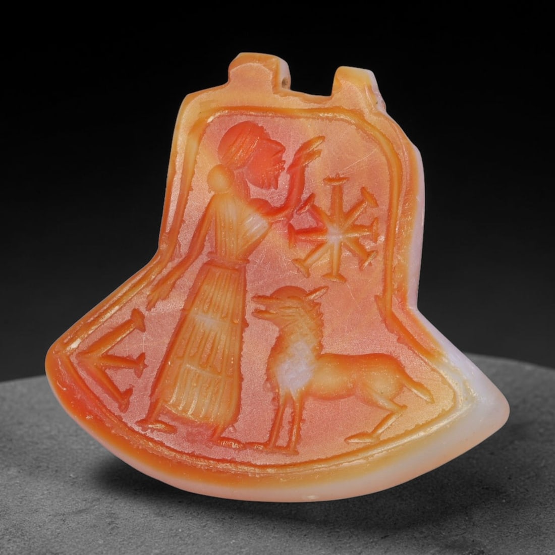 Vintage Natural Carnelian Agate Revival Indo-Persian Glyptic Figural Talisman Amulet Plaque, 31FL: This vintage talisman pendant plaque is skillfully carved from natural banded carnelian agate, crafted in a style referencing ancient Indo-Persian glyptic art traditions. The face bears detailed relie