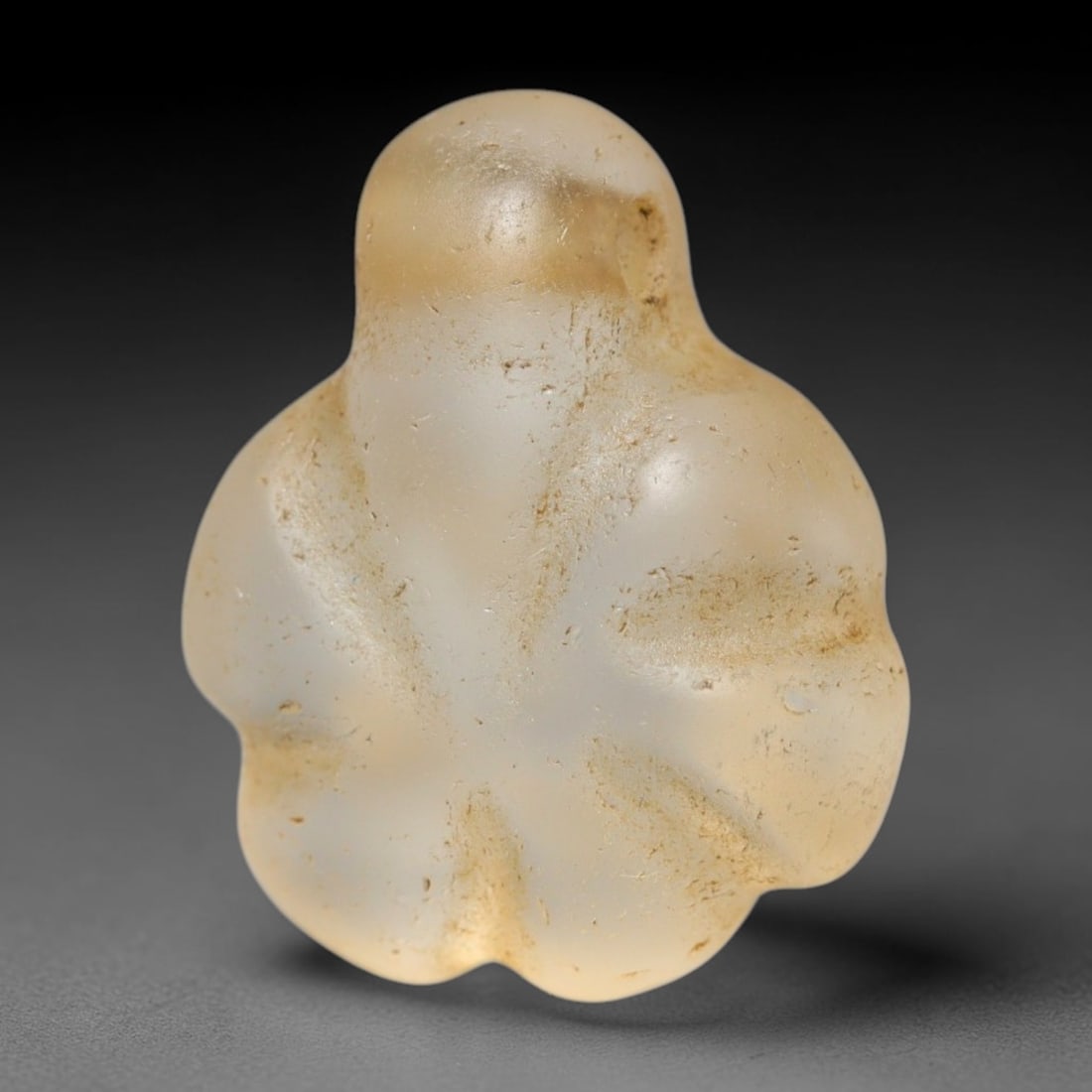 Ancient Medieval Coptic Christian Egyptian Culture Rock Crystal Amulet (300-1000 CE), 80FY: This antique rock crystal amulet originates from Coptic Christian Egyptian Culture, a region with a long-standing tradition of crafting translucent hardstone talismans for devotional and funerary use.