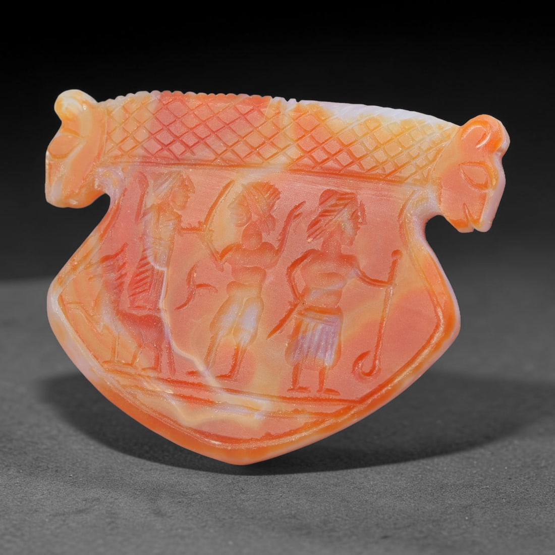 Vintage Natural Carnelian Agate Revival Indo-Persian Glyptic Figural Talisman Amulet Plaque, 16FK: This vintage talisman pendant plaque is skillfully carved from natural banded carnelian agate, crafted in a style referencing ancient Indo-Persian glyptic art traditions. The face bears detailed relie