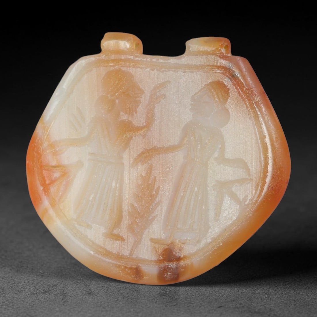 Vintage Natural Carnelian Agate Revival Indo-Persian Glyptic Figural Talisman Amulet Plaque, 63FK: This vintage talisman pendant plaque is skillfully carved from natural banded carnelian agate, crafted in a style referencing ancient Indo-Persian glyptic art traditions. The face bears detailed relie