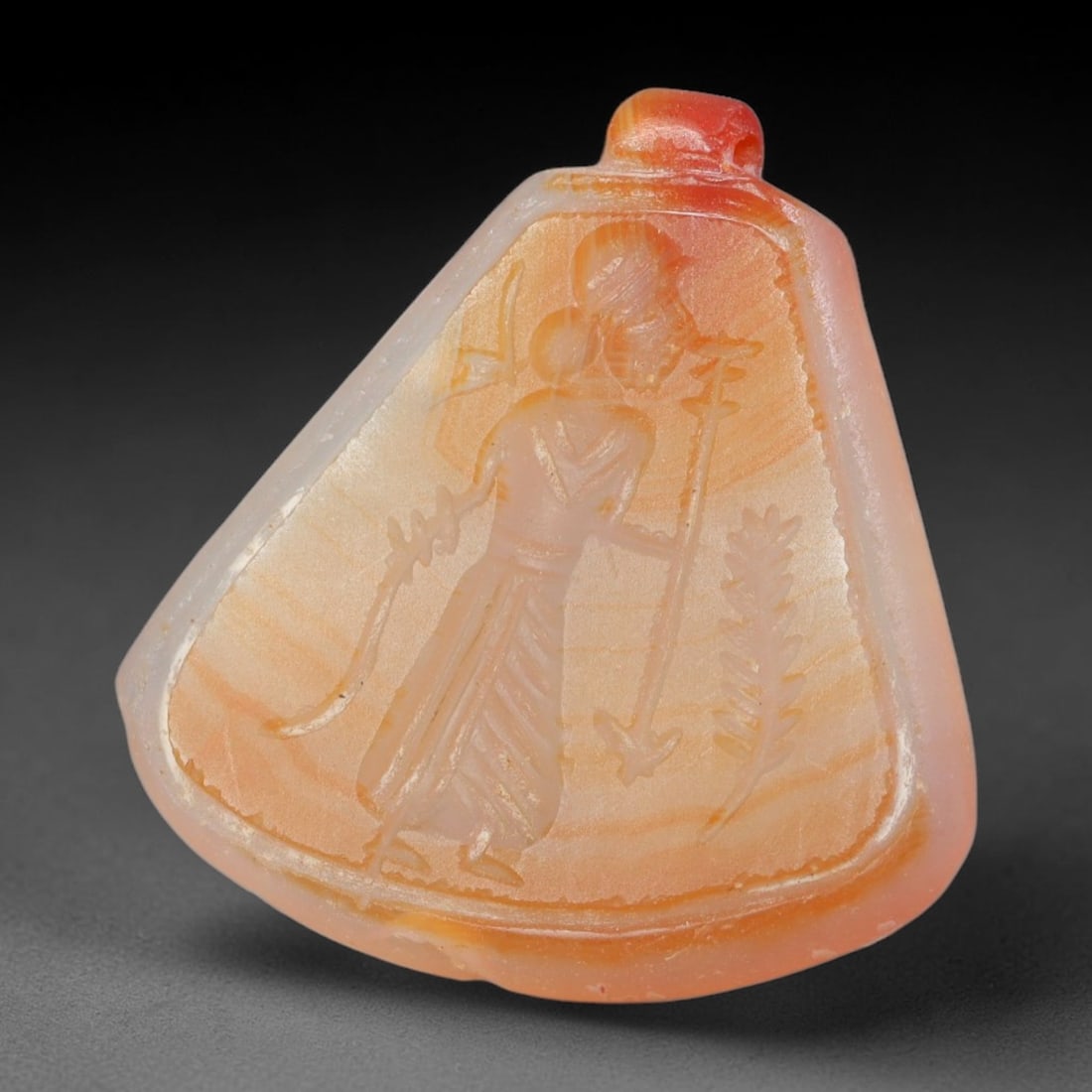 Vintage Natural Carnelian Agate Revival Indo-Persian Glyptic Figural Talisman Amulet Plaque, 17FL: This vintage talisman pendant plaque is skillfully carved from natural banded carnelian agate, crafted in a style referencing ancient Indo-Persian glyptic art traditions. The face bears detailed relie