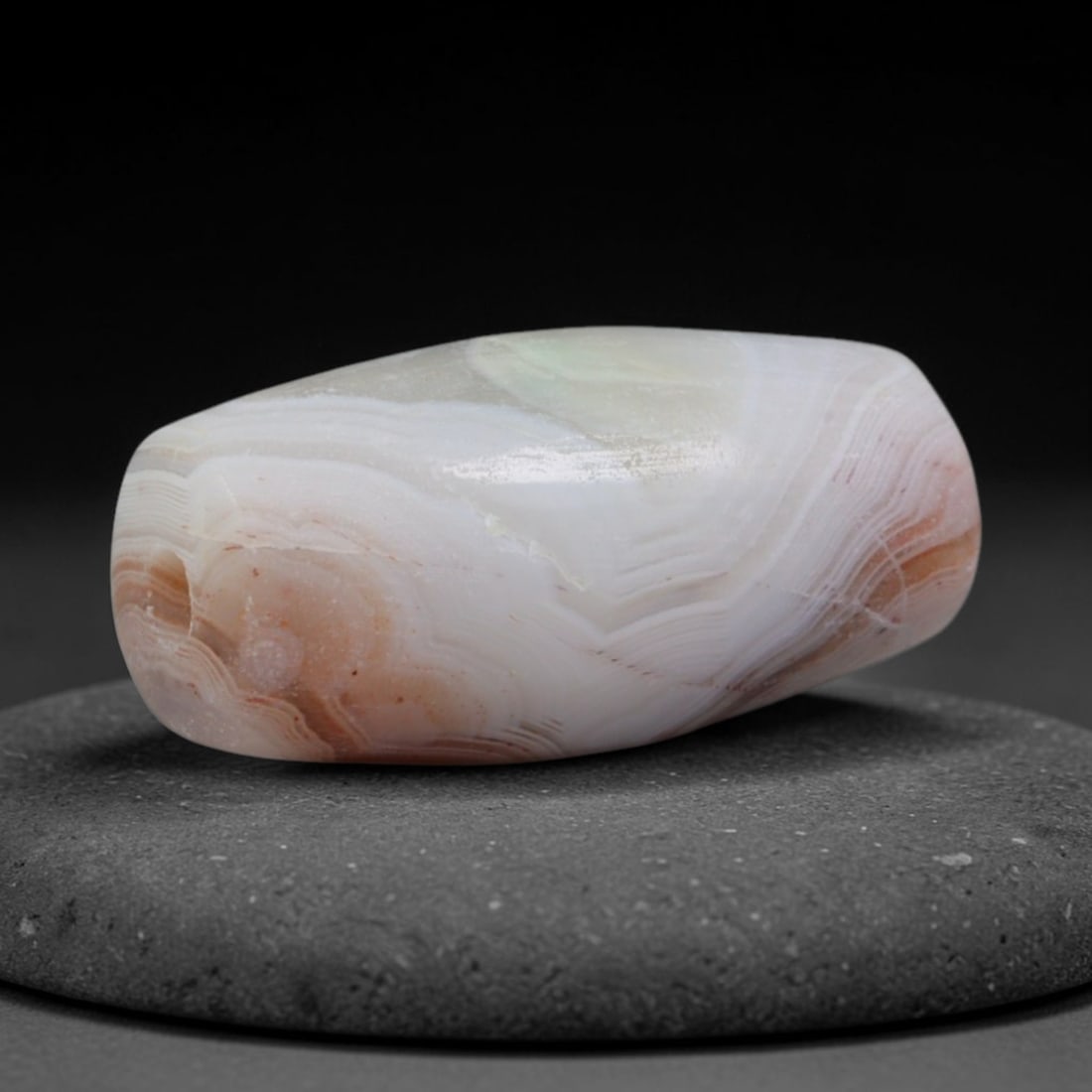 Ancient Mughal Gujarat Cambay Banded Agate Barrel Bead (1526-1800 CE), 13AD: This antique banded agate barrel bead hails from the renowned Cambay lapidary workshops of Mughal-era Gujarat, the preeminent center for fine chalcedony bead production supplying Indian Ocean and Silk