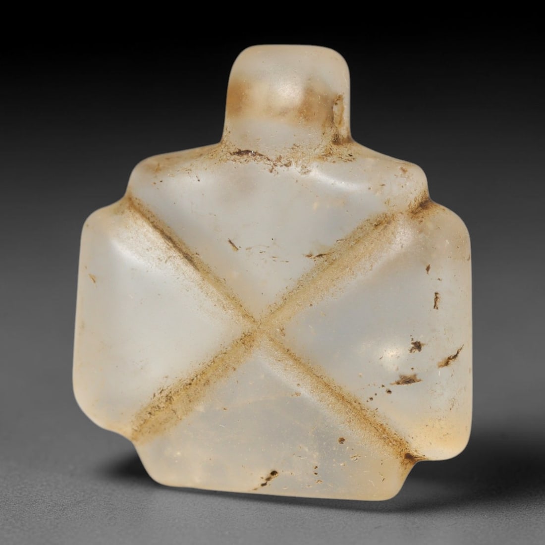 Ancient Medieval Coptic Christian Egyptian Culture Rock Crystal Amulet (300-1000 CE), 95FY: This antique rock crystal amulet originates from Coptic Christian Egyptian Culture, a region with a long-standing tradition of crafting translucent hardstone talismans for devotional and funerary use.