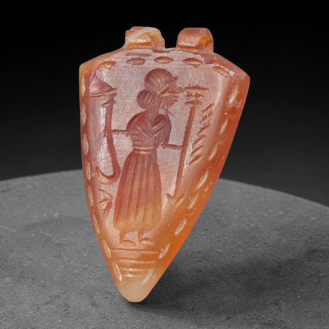 Vintage Natural Carnelian Agate Revival Indo-Persian Glyptic Figural Talisman Amulet Plaque, 55FL: This vintage talisman pendant plaque is skillfully carved from natural banded carnelian agate, crafted in a style referencing ancient Indo-Persian glyptic art traditions. The face bears detailed relie