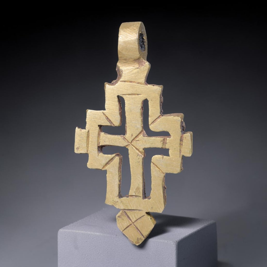 Vintage Ethiopian Copper Alloy Cross Pendant, 13EJ: Crafted from copper alloy, this traditional Ethiopian cross pendant features integrated suspension loop for wear. Shows authentic surface patina consistent with vintage origin. Dimensions: 4.7x2.5cm. 
