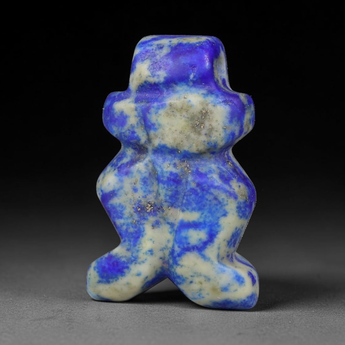 Ancient Medieval Coptic Egyptian Lapis Lazuli Amulet (400-800 CE), 29EG: This antique lapis lazuli amulet originates from Ancient Medieval Coptic Egyptian cultural tradition, created to function as a wearable protective talisman for personal spiritual safeguard. The deepbl