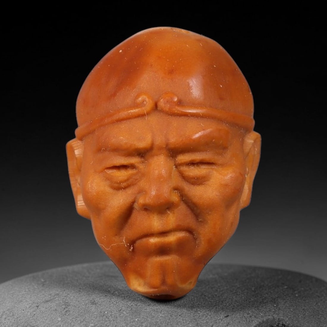 A Chinese Carved Natural Olive Nut Drilled Art Bead, 55BZ: Traditional craft bead carved from solid natural olive nut core, representing a classic miniature Chinese micro-carving folk art piece with a pre-drilled suspension bore integrated for easy threading 