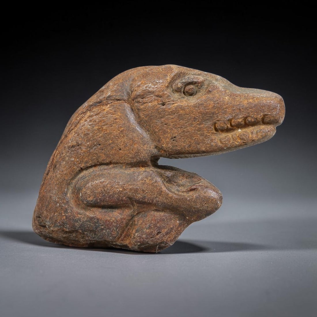 Ancient Near Eastern Stone Zoomorphic Effigy (500BCE-300CE), 61EJ: This antique stone zoomorphic effigy originates from ancient Near Eastern cultural tradition, crafted for ritual and talismanic application. The porous stone exhibits deep burial patina, textured aged