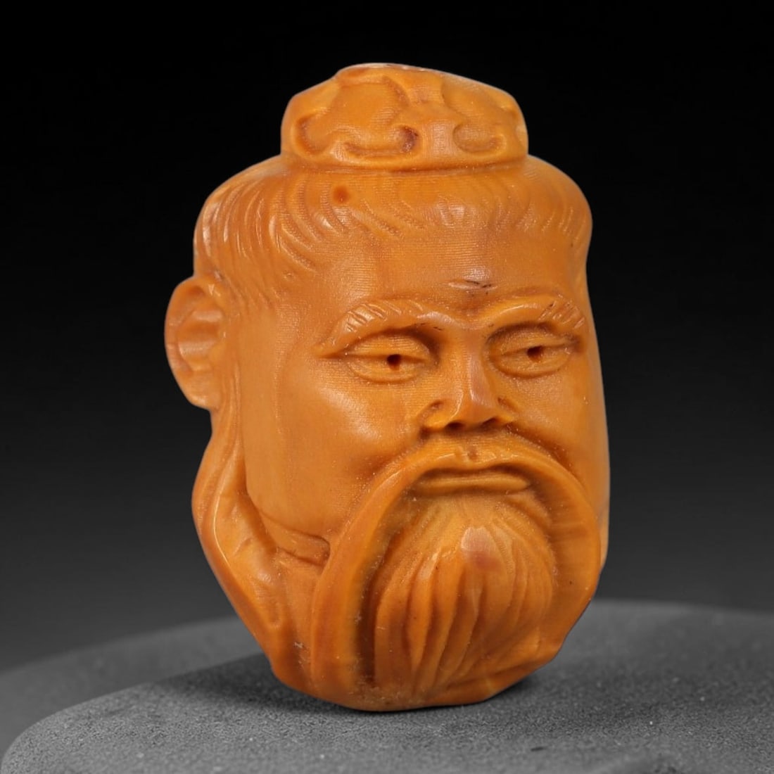 A Chinese Carved Natural Olive Nut Drilled Art Bead, 32BZ: Traditional craft bead carved from solid natural olive nut core, representing a classic miniature Chinese micro-carving folk art piece with a pre-drilled suspension bore integrated for easy threading 