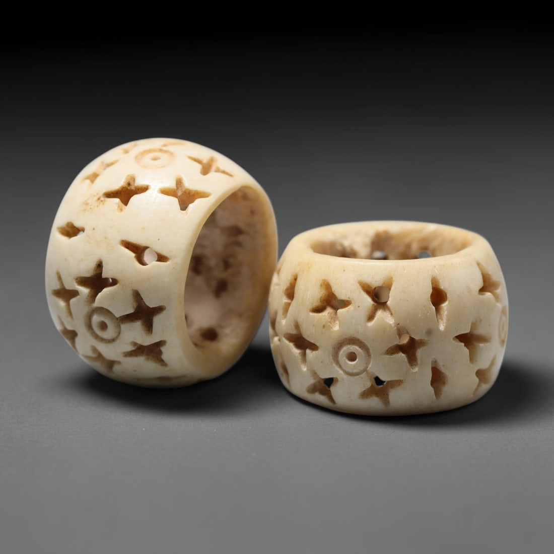 Antique Sino-Siberian Steppe Nomadic Craft Stag Antler Carved Bead Pair (Post 1850s), 12FV: Pair of beads skillfully carved from natural stag antler, originating from Sino-Siberian Steppe Nomadic craft traditions, produced post 1850s. The antler material holds attractive natural aged patina,