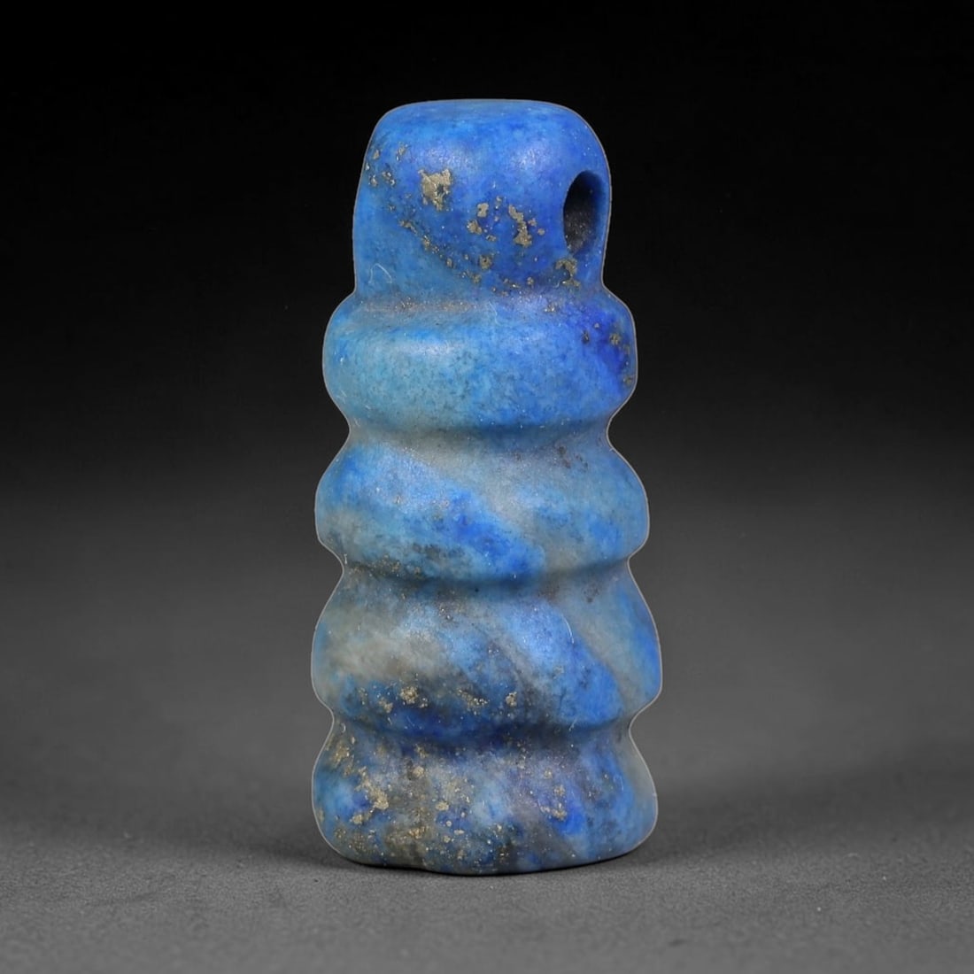 Ancient Medieval Coptic Egyptian Lapis Lazuli Amulet (400-800 CE), 51EG: This antique lapis lazuli amulet originates from Ancient Medieval Coptic Egyptian cultural tradition, created to function as a wearable protective talisman for personal spiritual safeguard. The deepbl