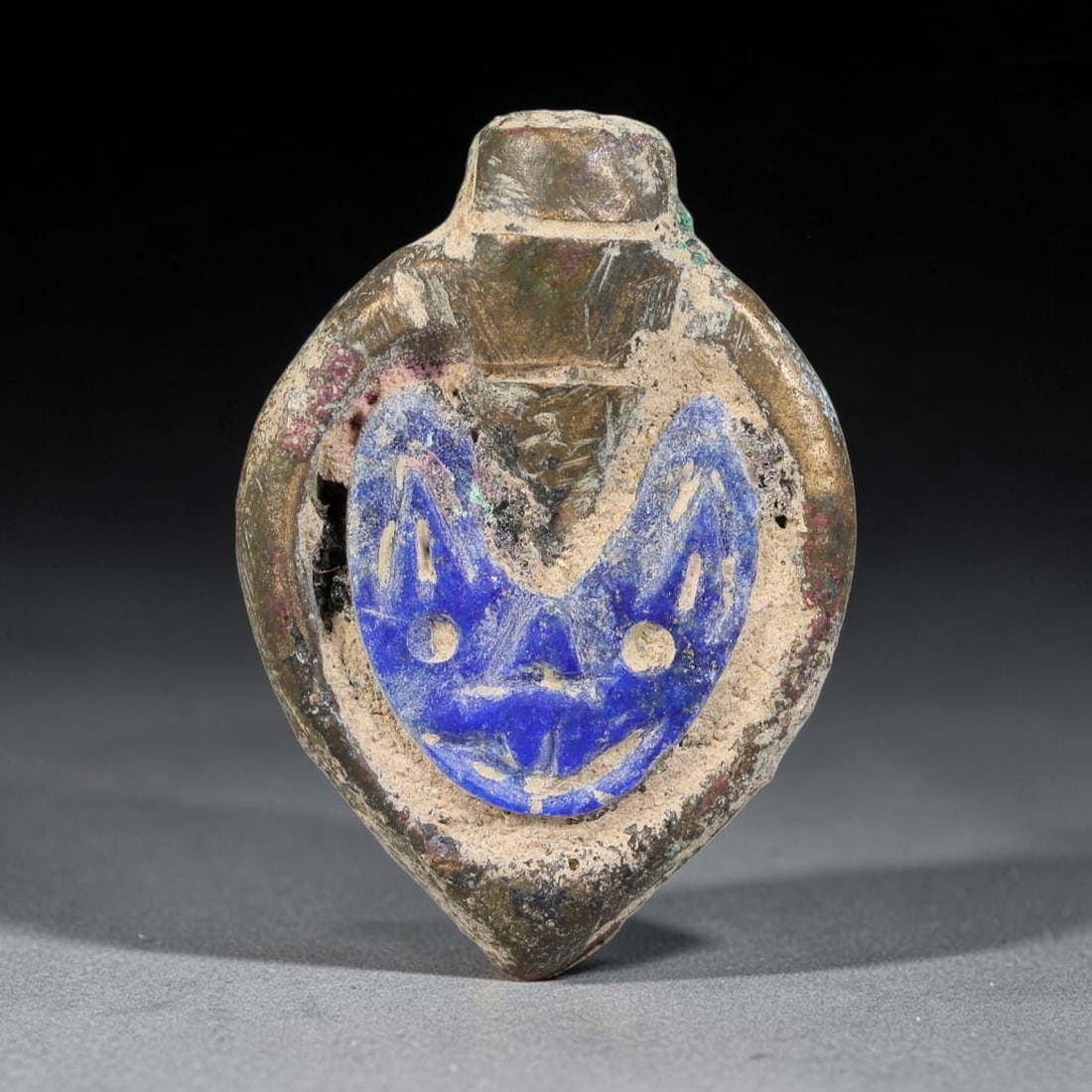 Ancient Medieval Byzantine Bronze Pendant With Stone Cameo (500-1200 CE), 11EG: This antique circular bronze pendant originates from medieval Byzantine cultural tradition, set with an inset carved stone cameo and made to serve as a wearable protective personal amulet. The bronze 