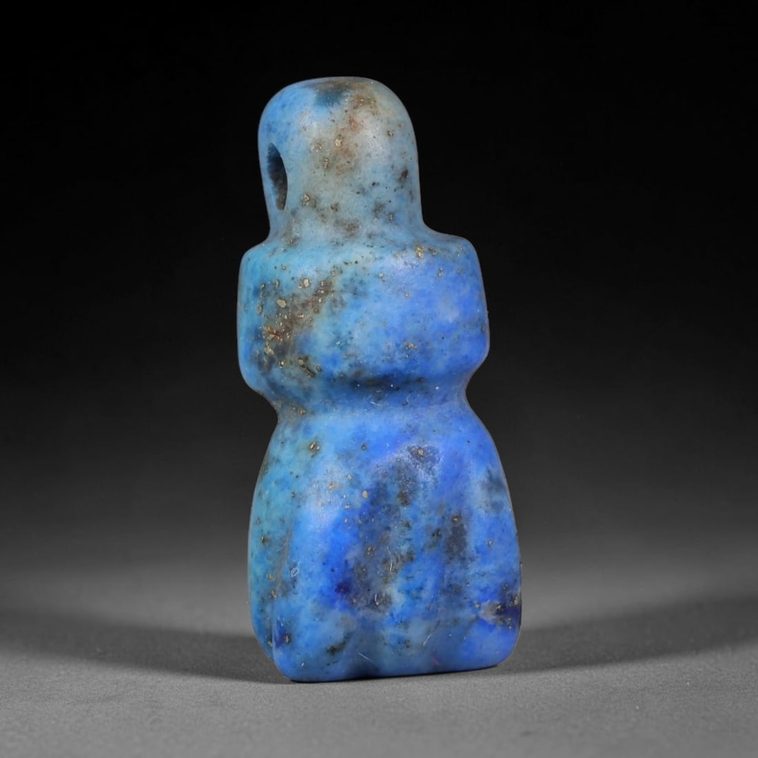 Ancient Medieval Coptic Egyptian Lapis Lazuli Amulet (400-800 CE), 25EG: This antique lapis lazuli amulet originates from Ancient Medieval Coptic Egyptian cultural tradition, created to function as a wearable protective talisman for personal spiritual safeguard. The deepbl