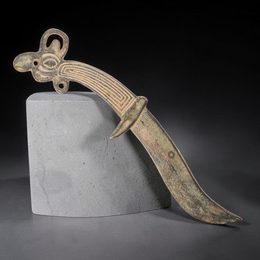 Antique Sino-Himalayan Bronze Ritual Dagger, 35EK: Antique Sino-Himalayan bronze ritual dagger displaying authentic age-related patina and surface wear consistent with antique origin. Features decorative detailing across the handle and blade. Dimensio
