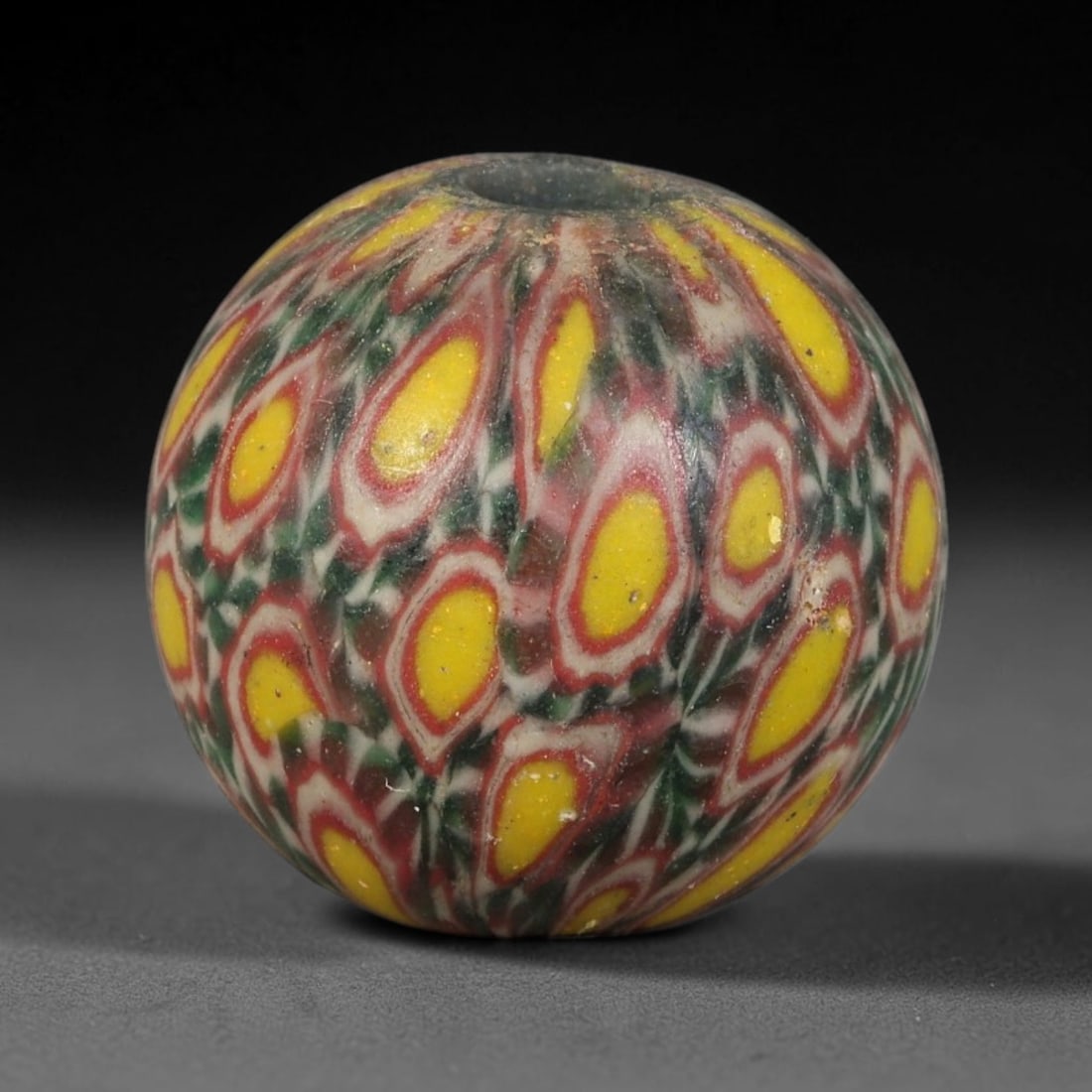 Antique Borneo Glass Trade Bead - 16mm Vintage Handcrafted Bead, 11AA: Antique Borneo glass beads hold deep cultural and historical significance within Southeast Asian maritime trade networks. For centuries, these glass spheres circulated as vital currency, ceremonial ta