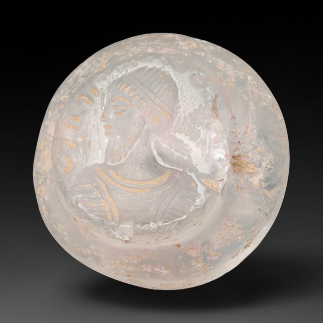 Ancient Sasanian Persian Rock Crystal Royal Portrait Intaglio Stamp Seal (224-651 CE), 69EQ: This domed wearable stamp seal is crafted from translucent rock crystal originating from the Sasanian Persian Empire. The circular intaglio surface presents a profile bust of a bearded royal figure we
