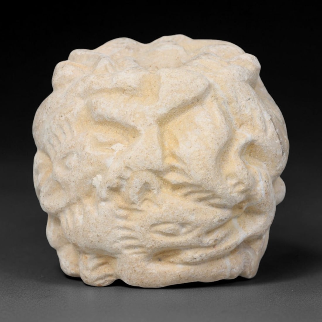 Early Islamic Abbasid Limestone Multi-Face Cylinder Talisman Seal (c.750-950 CE), 83EQ: Carved from pale cream limestone originating from Abbasid Caliphate territories across the Iranian plateau and Mesopotamia. This miniature spherical-cylinder seal is decorated in high relief with over
